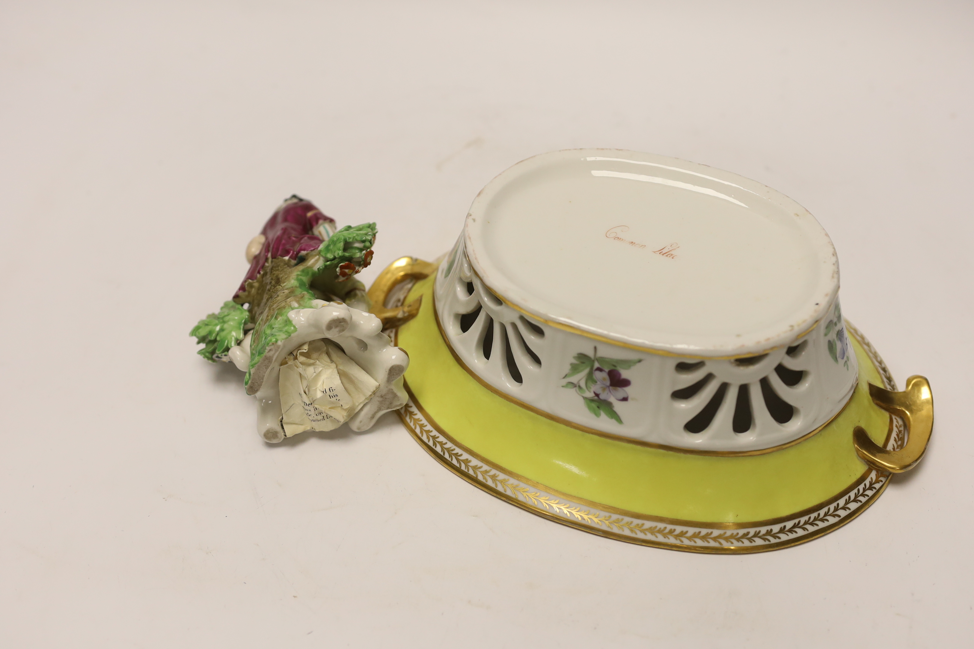 An English porcelain yellow ground botanical specimen basket, c.1795–1800 19th century Derby figure group together with a Victorian ‘Common Lilac’ dish, 25cm